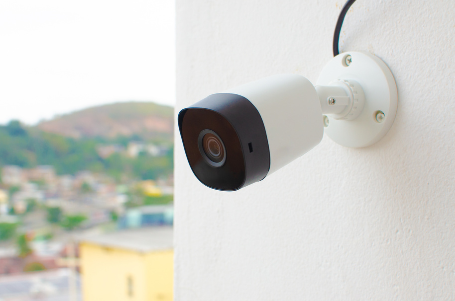 Video Camera CCTV, CFTV security camera, white wall camera, safely recording the external environment in a busy place. Safe circuit, theft protection. Surveillance view.
